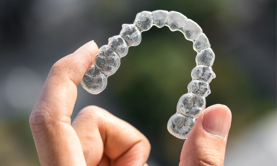 A close up image of a clear aligner.